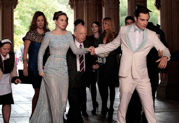 Freshly minted Mr and Mrs Chuck Bass (Leighton Meester and Ed Westwick) --in matching accessories!--- are taken into police custody for questioning surrounding the death of Bart Bass!